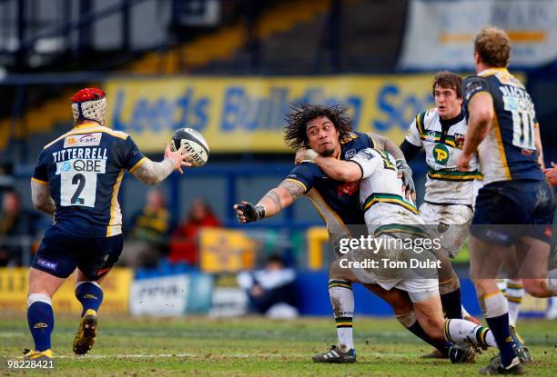 Alfie To'oala of Leeds Carnegie passes the ball to Andy Titterrell during the Guinness Premiership match between Leeds Carnegie and Northampton...