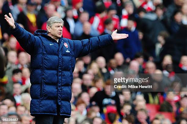 Manager of Arsenal, Arsene Wenger gestures during the Barclays Premier League match between Arsenal and Wolverhampton Wanderers at the Emirates...