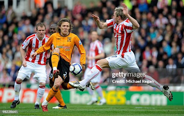 Jimmy Bullard of Hull battles with Liam Lawrence of Stoke during the Barclays Premier League match between Stoke City and Hull City at the Britannia...