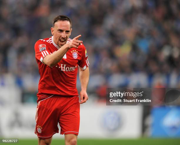Franck Ribery of Bayern celebrates scoring his team's first goal during the Bundesliga match between FC Schalke 04 and FC Bayern Muenchen at the...