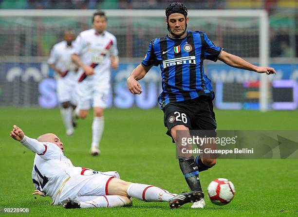 Andrea Raggi of Bologna and Cristian Chivu of Inter in action during the Serie A match between FC Internazionale Milano and Bologna FC at Stadio...