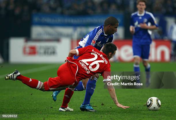 Jefferson Farfan of Schalke and Diego Contento of Muenchen battle for the ball during the Bundesliga match between FC Schalke 04 and FC Bayern...