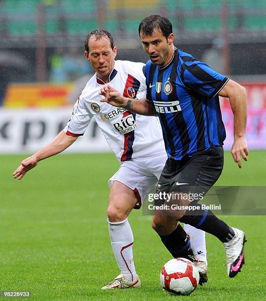 Adailton of Bologna and Dejan Stankovic of Inter in action during the Serie A match between FC Internazionale Milano and Bologna FC at Stadio...