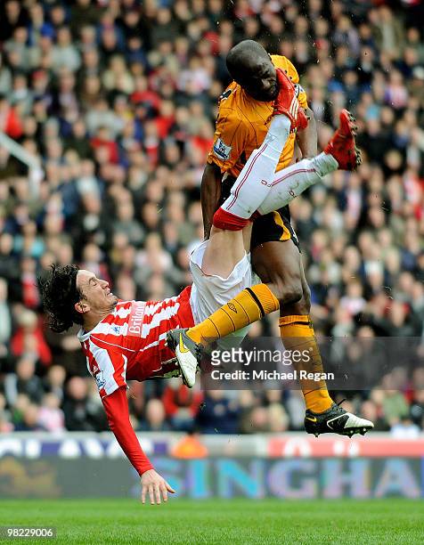 Tuncay of Stoke kicks George Boateng of Hull in the head and knocks him out during the Barclays Premier League match between Stoke City and Hull City...