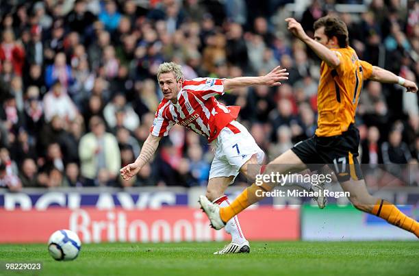 Liam Lawrence of Stoke scores his team's second goal during the Barclays Premier League match between Stoke City and Hull City at the Britannia...