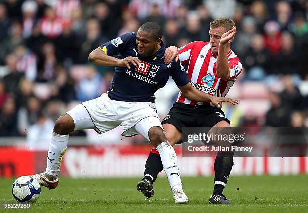 Wilson Palacios of Spurs is challenged by Lee Catermole of Sunderland during the Barclays Premier League match between Sunderland and Tottenham...