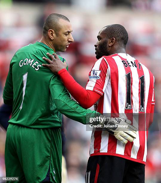 Darren Bent of Sunderland has a chat with Spurs goalkeeper Heurelho Gomes during the Barclays Premier League match between Sunderland and Tottenham...