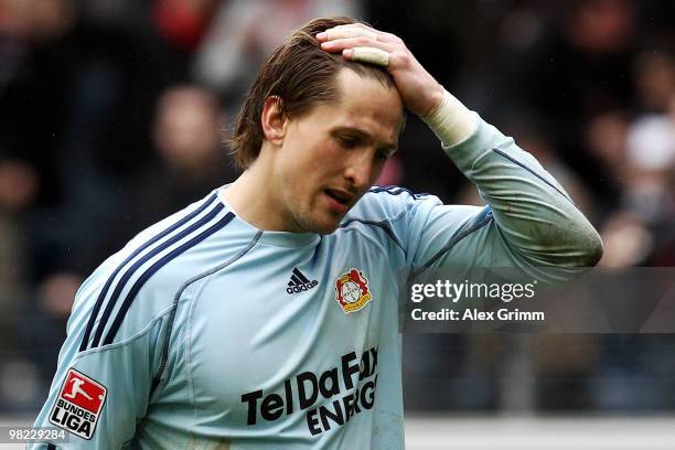 Goalkeeper Rene Adler of Leverkusen reacts after the Bundesliga match between Eintracht Frankfurt and Bayer Leverkusen at the Commerzbank Arena on...