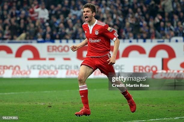 Thomas Mueller of Muenchen celebrates after he scores his team's 2nd goal during the Bundesliga match between FC Schalke 04 and FC Bayern Muenchen at...