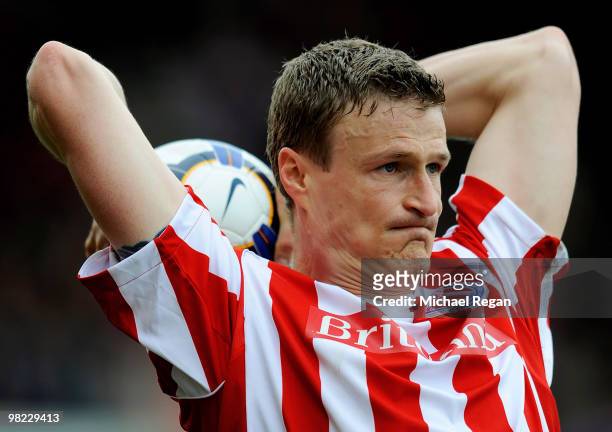Robert Huth of Stoke takes a throw in during the Barclays Premier League match between Stoke City and Hull City at the Britannia Stadium on April 3,...