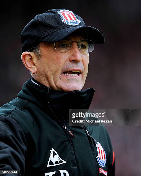 Stoke manager Tony Pulis shouts instructions to his players during the Barclays Premier League match between Stoke City and Hull City at the...