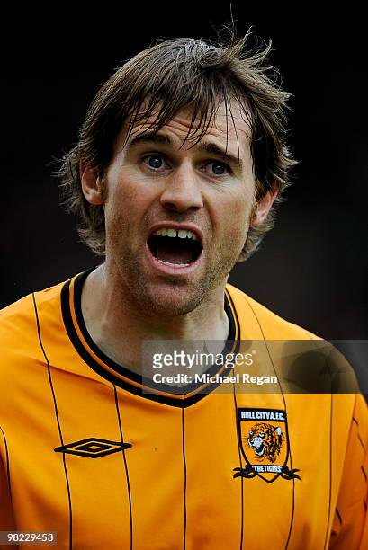 Kevin Kilbane of Hull shouts to team mates during the Barclays Premier League match between Stoke City and Hull City at the Britannia Stadium on...