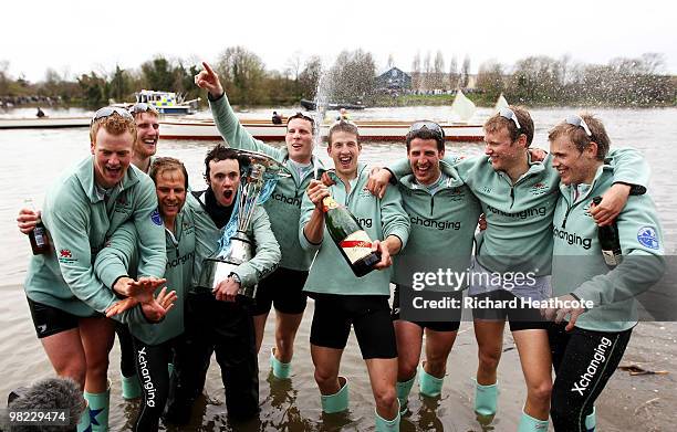 The Cambridge crew celebrate victory after the 156th Oxford and Cambridge University Boat Race on the River Thames on April 3, 2010 in London,...