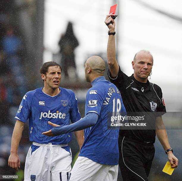 Portsmouth's Belgian defender Anthony Vanden Borre is sent off by Referee Steve Bennett during the English Premier League football match between...