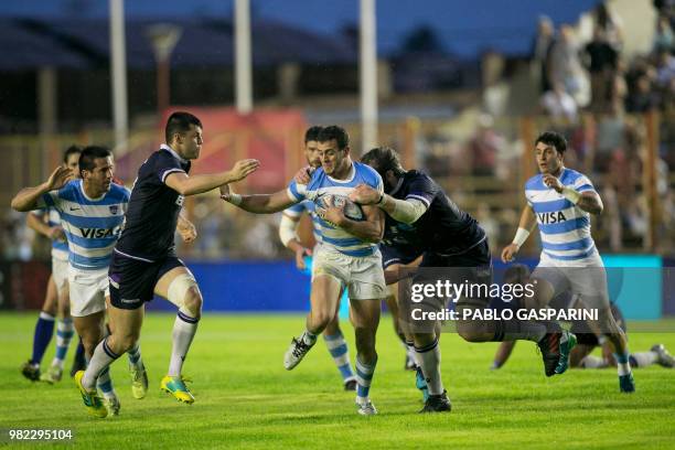 Emiliano Boffelli from Argentina runs with the ball, during their international test match against Scotland, at the Centenario stadium, in...