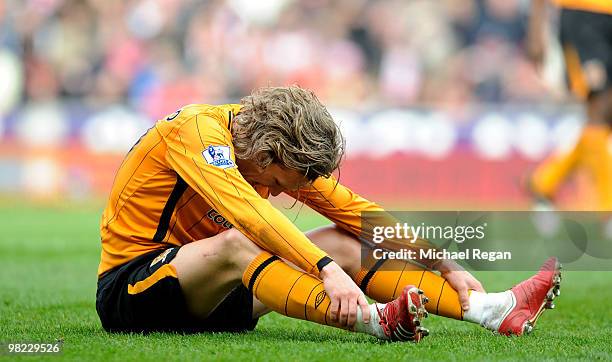 Jimmy Bullard of Hull looks dejected during the Barclays Premier League match between Stoke City and Hull City at the Britannia Stadium on April 3,...