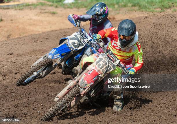 Nathan LaPorte and Brandon Scharer race through the corner during the Lucas Oil Pro Motorcross - Tennessee National race at Muddy Creek Raceway in...