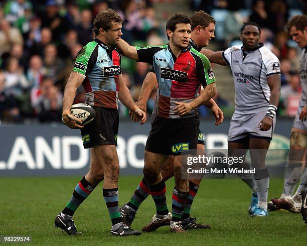 Nick Evans of Harlequins is congratulated by his team-mate Danny Care after scoring a try during the Guinness Premiership match between Harlequins...