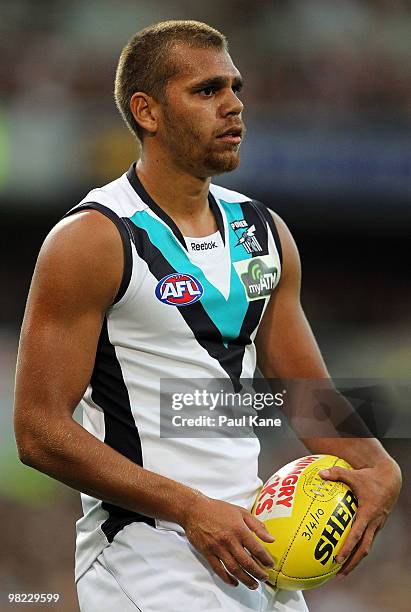 Nathan Krakouer of the Power looks for a pass during the round two AFL match between the West Coast Eagles and Port Adelaide Power at Subiaco Oval on...