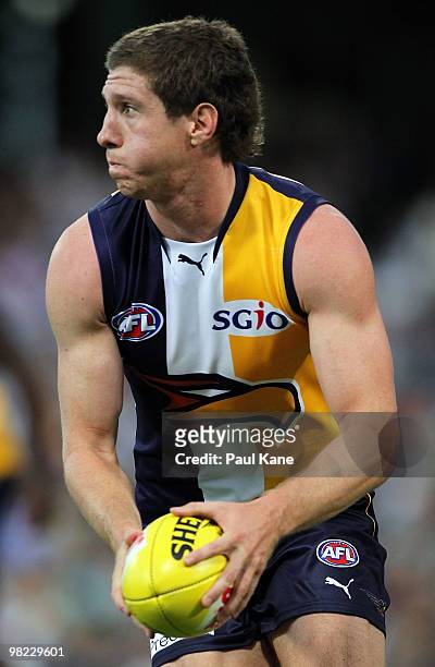 Patrick McGinnity of the Eagles looks for a pass option during the round two AFL match between the West Coast Eagles and Port Adelaide Power at...