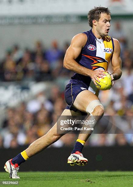 Mitchell Brown of the Eagles runs with the ball during the round two AFL match between the West Coast Eagles and Port Adelaide Power at Subiaco Oval...