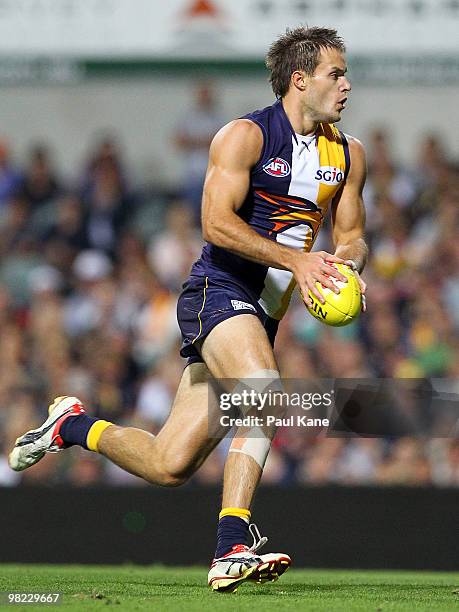 Mitchell Brown of the Eagles runs with the ball during the round two AFL match between the West Coast Eagles and Port Adelaide Power at Subiaco Oval...