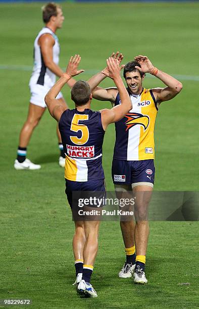 Brad Ebert and Josh Kennedy of the Eagles celebrate a goal during the round two AFL match between the West Coast Eagles and Port Adelaide Power at...