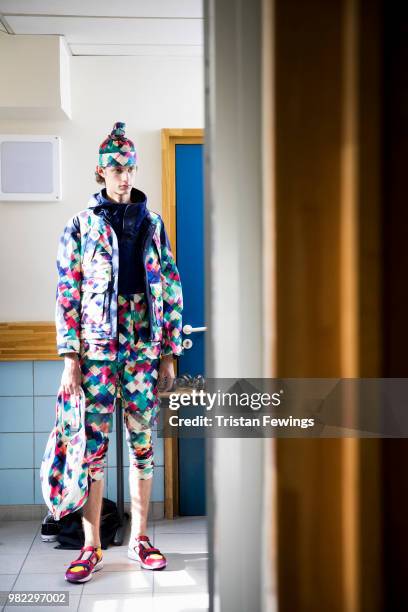 Model poses backstage prior the White Mountaineering Menswear Spring Summer 2019 show as part of Paris Fashion Week on June 23, 2018 in Paris, France.