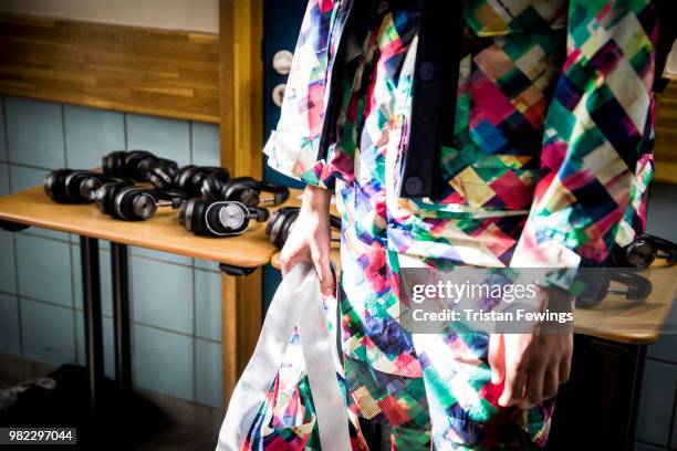 Model poses backstage prior the White Mountaineering Menswear Spring Summer 2019 show as part of Paris Fashion Week on June 23, 2018 in Paris, France.