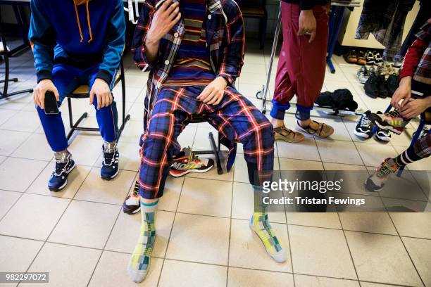 Models pose backstage prior the White Mountaineering Menswear Spring Summer 2019 show as part of Paris Fashion Week on June 23, 2018 in Paris, France.