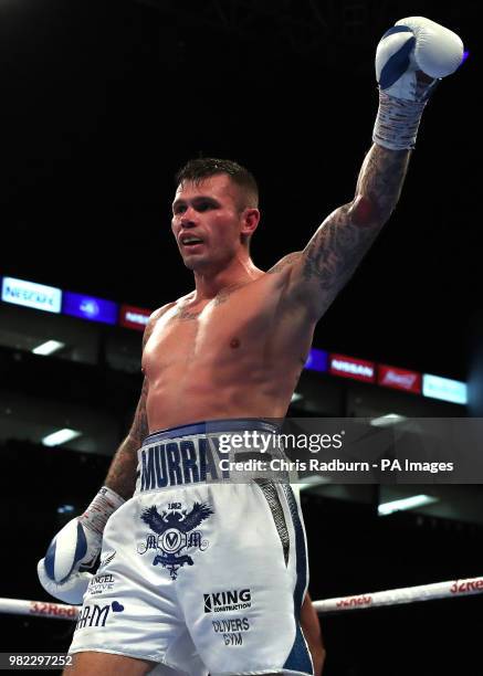 Martin Murray celebrates victory by points in the The WBC Silver Middleweight Championship at The O2, London.