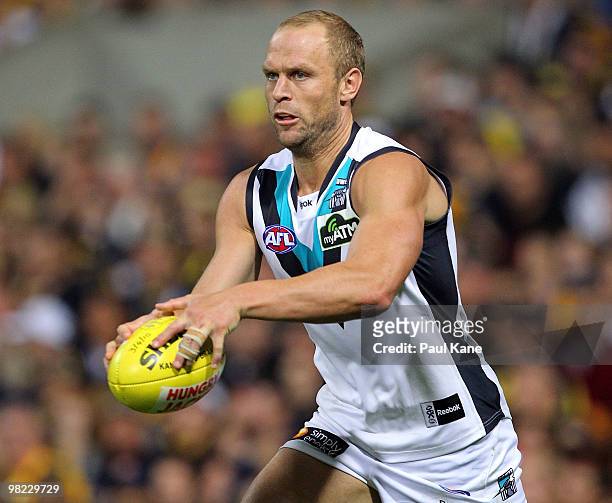 Chad Cornes of the Power looks to pass the ball during the round two AFL match between the West Coast Eagles and Port Adelaide Power at Subiaco Oval...