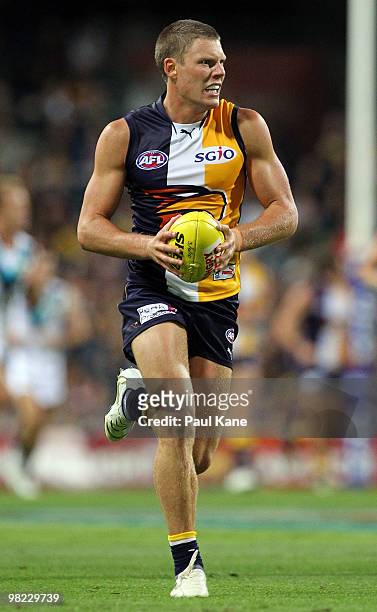 Eric Mackenzie of the Eagles looks for a pass option during the round two AFL match between the West Coast Eagles and Port Adelaide Power at Subiaco...