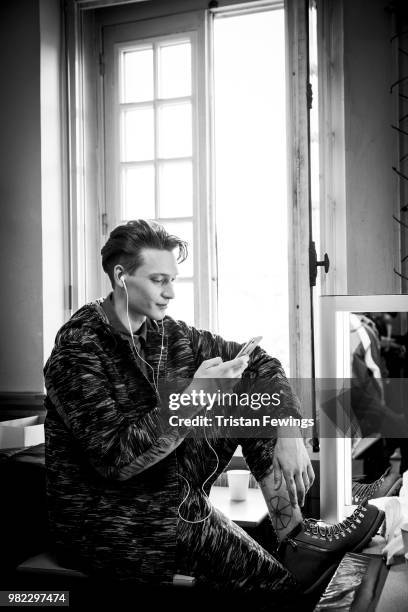 Model poses backstage prior the White Mountaineering Menswear Spring Summer 2019 show as part of Paris Fashion Week on June 23, 2018 in Paris, France.