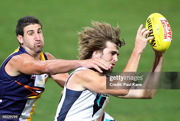 Dean Cox of the Eagles attempts to spoil Justin Westhoff of the Power during the round two AFL match between the West Coast Eagles and Port Adelaide...