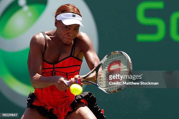 Venus Williams of the United States returns a shot against Kim Clijsters of Belgium during the women's final of the 2010 Sony Ericsson Open at...