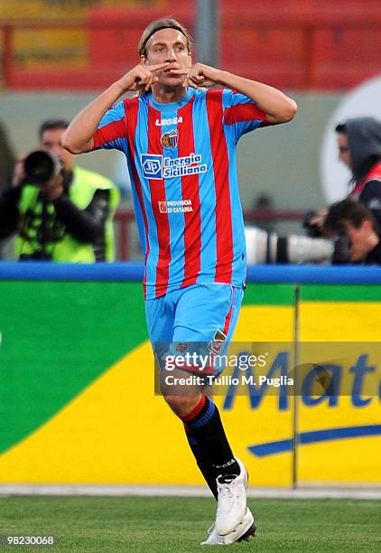 Maxi Lopez of Catania celebrates after scoring the opening goal during the Serie A match between Catania Calcio and US Citta di Palermo at Stadio...