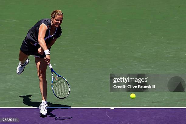 Kim Clijsters of Belgium serves against Venus Williams of the United States during the women's final of the 2010 Sony Ericsson Open at Crandon Park...