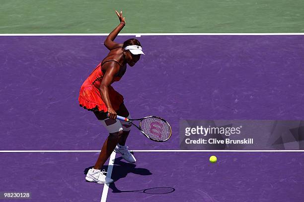 Venus Williams of the United States returns a shot against Kim Clijsters of Belgium during the women's final of the 2010 Sony Ericsson Open at...