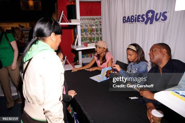 Actress and author Holly Robinson Peete, Ryann Elizabeth Peete, and former NFL quarterback Rodney Peete promote "My Brother Charlie" and "Not My...