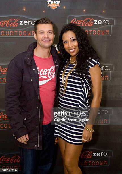 Ryan Seacrest and Melanie Fiona backstage during day 2 of the NCAA 2010 Big Dance Concert Series at White River State Park on April 3, 2010 in...