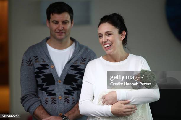 New Zealand Prime Minister Jacinda Ardern and partner Clarke Gayford pose for a photo with their new baby girl Neve Te Aroha Ardern Gayford on June...