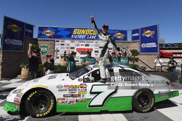 Will Rodgers, driver of the Kelly & Associates Insurance Group Ford, celebrates in Victory Lane after winning the NASCAR K&N Pro Series West Carneros...