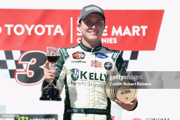 Will Rodgers, driver of the Kelly & Associates Insurance Group Ford, celebrates in Victory Lane after winning the NASCAR K&N Pro Series West Carneros...