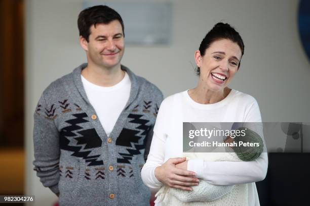 New Zealand Prime Minister Jacinda Ardern and partner Clarke Gayford pose for a photo with their new baby girl Neve Te Aroha Ardern-Gayford on June...