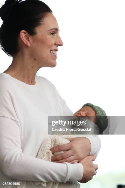 New Zealand Prime Minister Jacinda Ardern and partner Clarke Gayford pose for a photo with their new baby girl Neve Te Aroha Ardern Gayford June 24,...