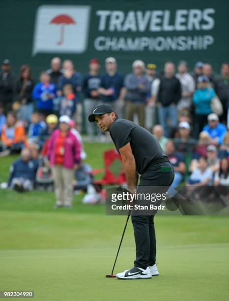 Jason Day of Australia watches his putt on the 17th hole during the third round of the Travelers Championship at TPC River Highlands on June 23, 2018...