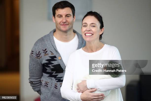 New Zealand Prime Minister Jacinda Ardern and partner Clarke Gayford pose for a photo with their new baby girl Neve Te Aroha Ardern-Gayford on June...