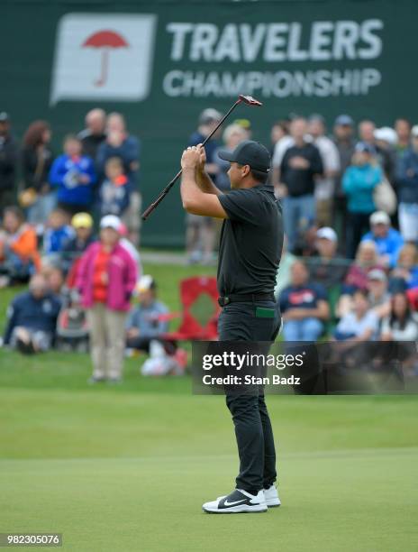 Jason Day of Australia reacts to his putt on the 17th hole during the third round of the Travelers Championship at TPC River Highlands on June 23,...