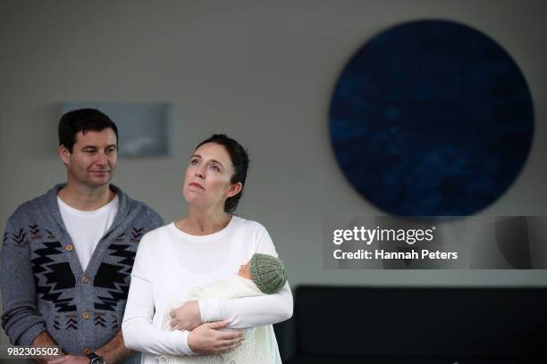 New Zealand Prime Minister Jacinda Ardern and partner Clarke Gayford pose for a photo with their new baby girl Neve Te Aroha Ardern-Gayford on June...